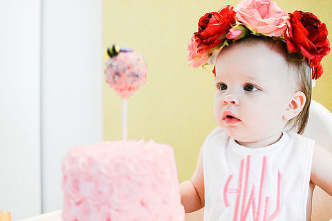 Baby's First Birthday with flower crown and cake pops